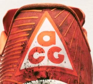 Nike Inc. has officially relaunched its All Conditions Gear (ACG) line as a standalone outdoor performance brand, signalling a strategic shift to deepen its presence in technical trail and outdoor markets. The move includes a renewed focus on trail running, hiking, exploration and other outdoor pursuits, and coincides with plans to open the first ACG-dedicated retail space — the ACG Base Camp — in Beijing’s Taikoo Li Sanlitun shopping district this month. ACG, originally launched in 1989, has a four-decade history as Nike’s specialist label for rugged, performance-oriented gear built to endure diverse environments. After periods of limited activity in recent years, the refreshed ACG reintegrates Nike’s Nike Trail product line and expands its mission to focus squarely on athletes and outdoor enthusiasts who demand gear capable of handling “all conditions.” Outdoor Performance at the Forefront Under the reimagined strategy, ACG’s product range emphasises high-performance footwear and apparel designed for off-road environments. Key offerings include updated trail shoes such as the ACG Ultrafly and ACG Zegama, as well as purpose-built apparel like technical tops and insulated jackets engineered to withstand extreme weather and terrain challenges. Nike has also expanded the All Conditions Racing Department, a collective of elite trail and outdoor athletes who will help shape future product development through real-world testing and performance feedback. Beijing’s ACG Base Camp: More Than Just a Store The first dedicated ACG retail space — dubbed ACG Base Camp — is scheduled to open this month in Taikoo Li Sanlitun, a vibrant Beijing shopping and cultural destination. Far beyond a traditional shop, Nike markets the Base Camp as a “physical manifesto” of the brand’s ethos — a space where community, exploration and gear innovation converge. Nike intends for the Base Camp to act as a hub for the brand’s outdoor narrative, offering immersive experiences and serving as a focal point for trail athletes and outdoor enthusiasts. The concept is expected to evolve over time, with additional activations planned at select Nike stores worldwide. Strategic Context and Industry Impact The ACG relaunch comes amid Nike’s broader “Sports Offense” strategy, which aims to sharpen its focus on core sports performance and reinvigorate sub-brands with meaningful identities that resonate with specialised athlete communities. By consolidating trail and outdoor performance under the ACG banner, Nike looks to compete more directly with established outdoor brands while reinforcing its technical innovation narrative. Analysts see the decision as part of Nike’s efforts to reinvigorate growth in categories that blend lifestyle appeal with authentic athletic performance — and to deepen engagement in key regions, particularly Asia, where outdoor sports participation and premium gear demand have been rising.