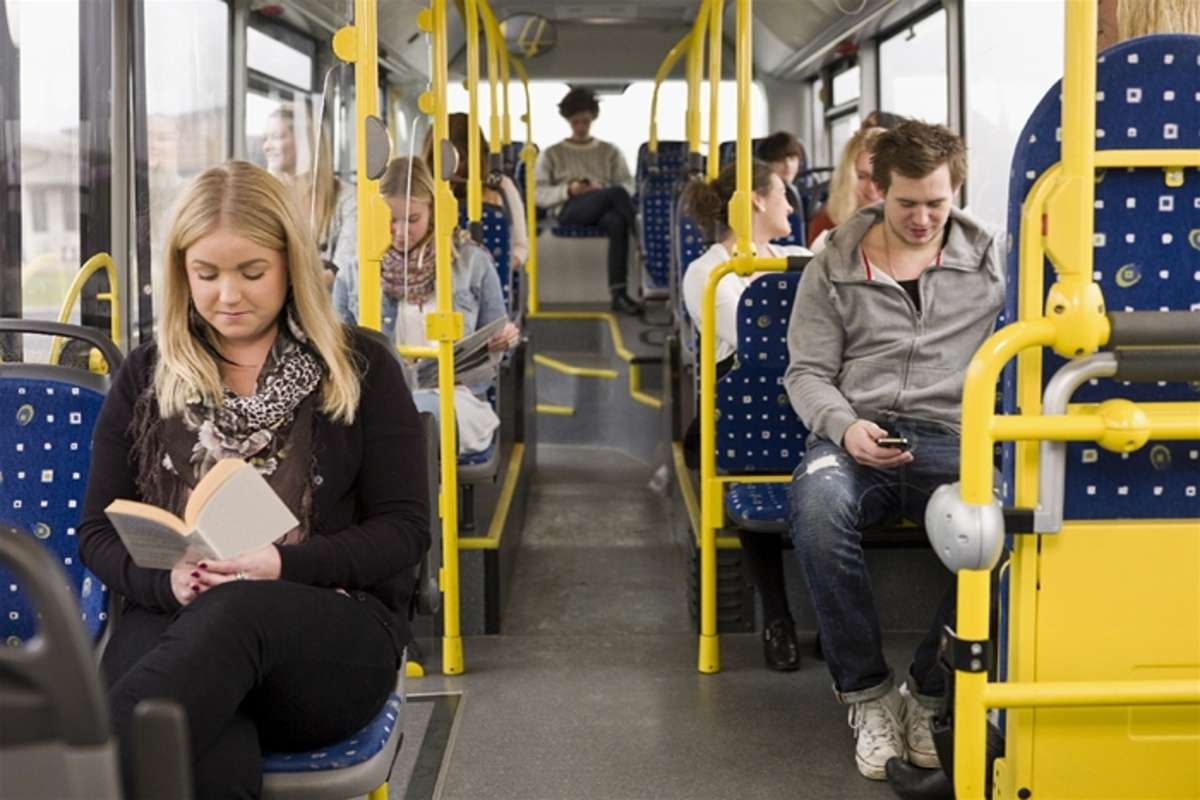 people seated in a public transport