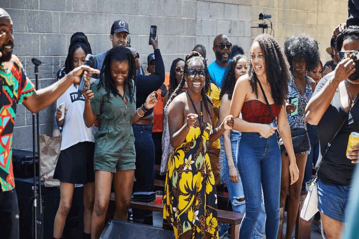 people having fun at an event, ilustrating how to experience a city like a local