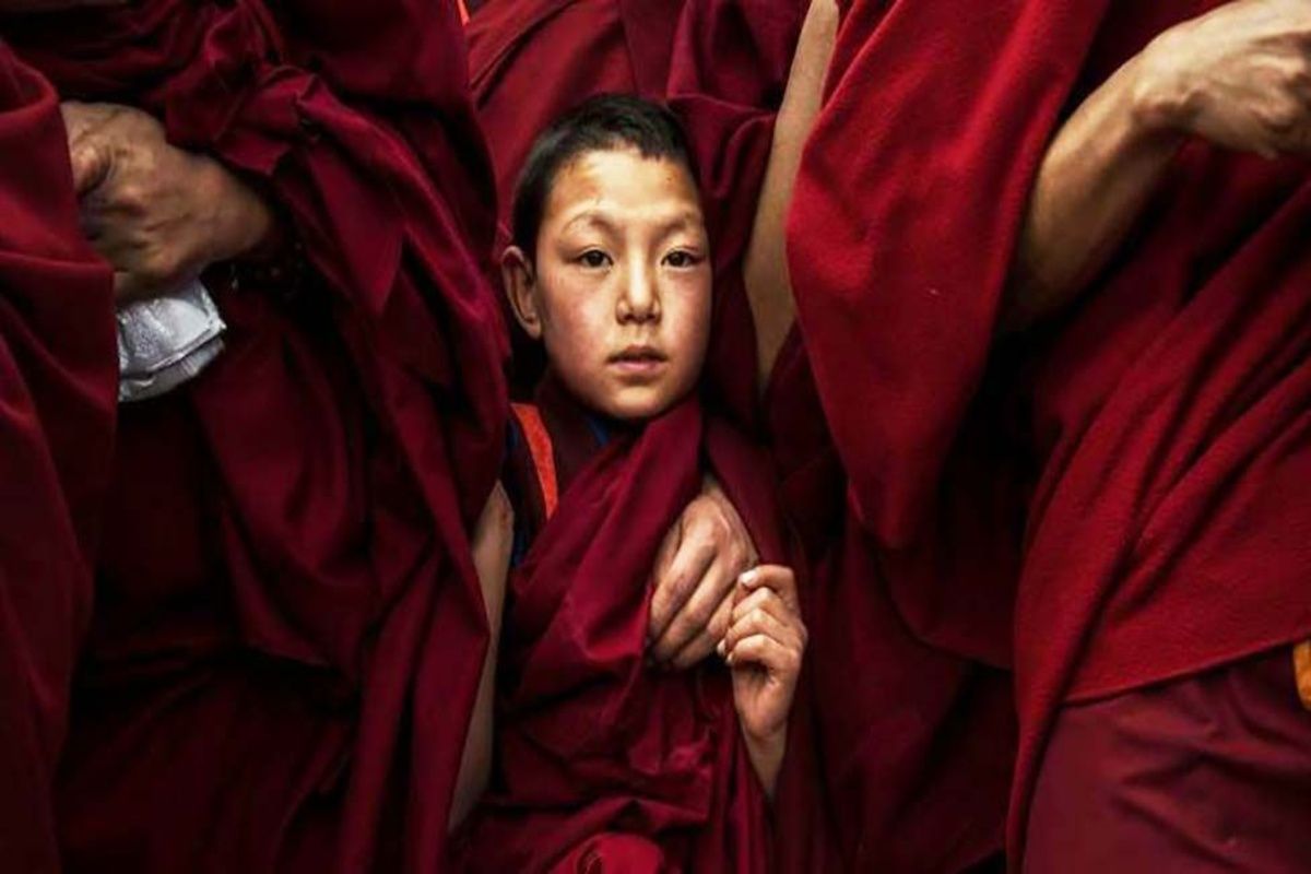 China men and a child in their traditional attire