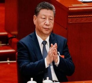 The president of china clapping hands together