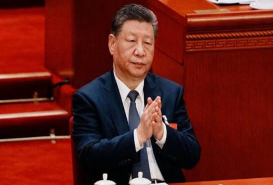 The president of china clapping hands together