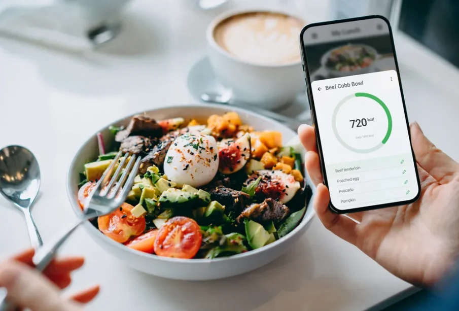A man counting calories while eating