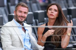 David Beckham and Victoria Beckham together.