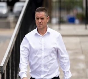 John Alford walking on the street