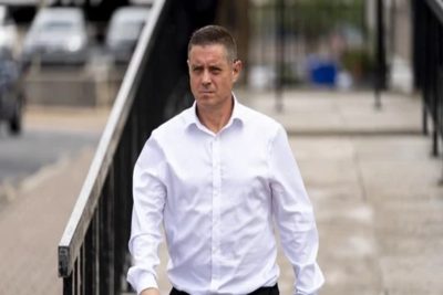 John Alford walking on the street