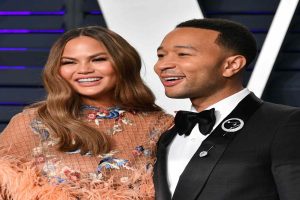 John Legend and Chrissy Teigen, one of the most admired couples, sharing a moment together at a public event.