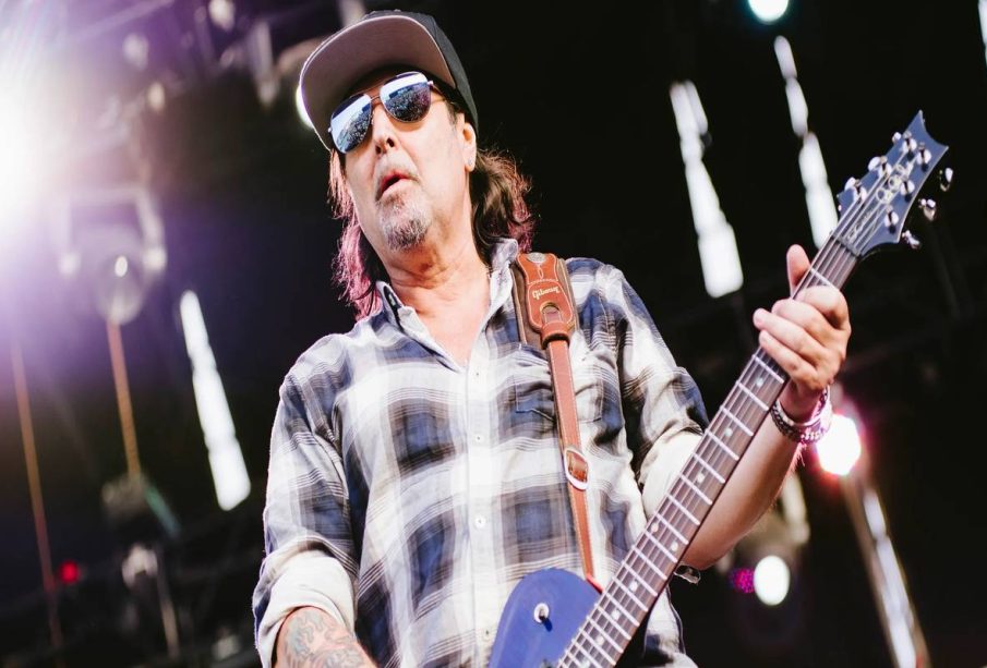Phil Campbell playing a guitar