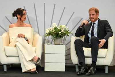 Prince Harry and Meghan Markle on a show