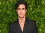 Charles Melton in a red carpet event
