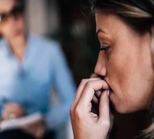 A woman suffering structural sexism