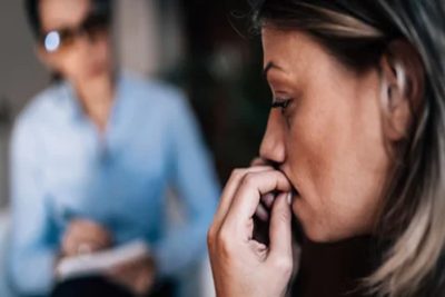 A woman suffering structural sexism