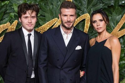 David and Lady Victoria Beckham with son at an event