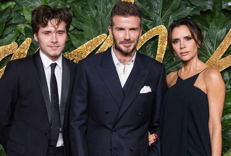 David and Lady Victoria Beckham with son at an event