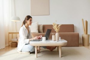 A woman studying using a laptop, a cognitive benefits of meditation and journaling