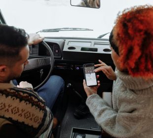 Man and woman using a digital tool