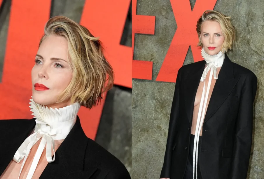 Charlize Theron Turns Heads in Dior Menswear at Apex Premiere
