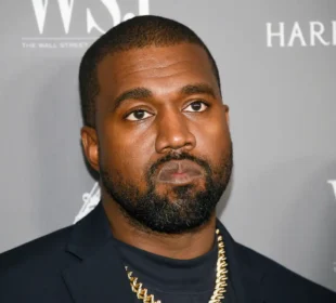 Kanye West posing for a picture