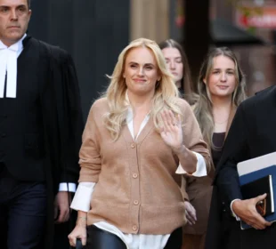 Rebel Wilson with lawyers by her sides